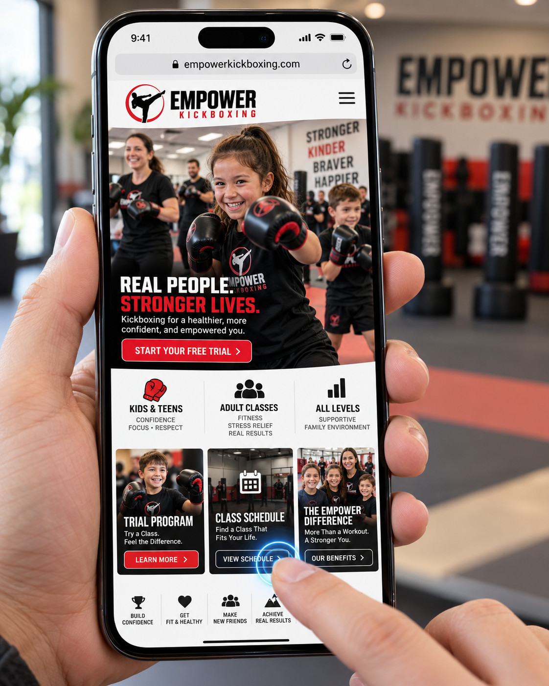 empower_kickboxing_mobile_compressed Empower Kickboxing on phone in Empower Kickboxing school